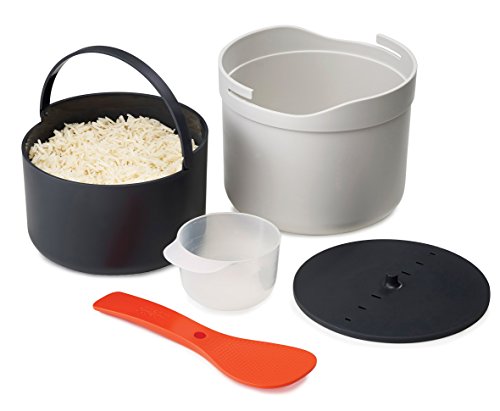 Effortless Rice Mastery: Joseph Joseph Microwave Rice Cooker Set for Perfectly Fluffy Grains This ingenious set transforms the rice cooking experience into a seamless, one-pot process. The set includes a 2 L cooking pot, a colander, a measuring cup, and a multi-purpose rice paddle. The rice paddle, with its dual functionality, not only locks the pot lid securely but also serves as a convenient spoon for fluffing and serving the cooked rice. The two carrying handles on the paddle make transporting the pot a breeze. The entire set is dishwasher safe, making cleanup a snap. Whether you're a novice in the kitchen or a seasoned chef, this rice cooker set elevates your rice-cooking game to new heights, ensuring consistently fluffy and delicious results with minimal effort.