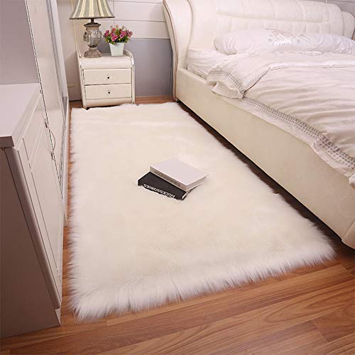 YOH Rectangle Luxury Fluffy Bedroom Bedside Rugs YOH Rectangle Luxurious Fluffy Bed room Bedside Rugs, Indoor Extremely Comfortable Fake Fur Sheepskin Space Rugs, Silky Lengthy Wool Ground Carpet for Residing Room Bench Youngsters Princess Room Decor, 2 x four Toes (White).