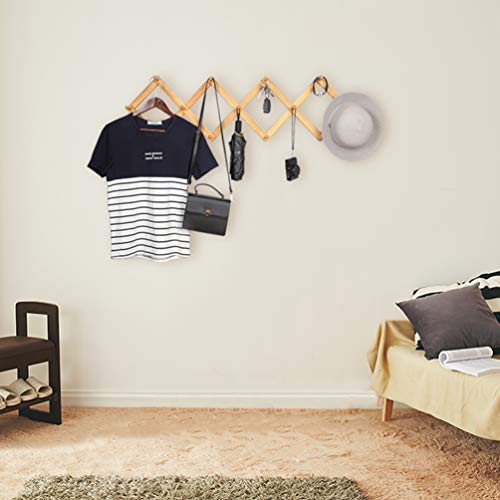 Expandable Wooden Coat Rack Hanger - Wall-Mounted Accordion Pine Wood Hook for Stylish Organization, Ideal for Hats, Caps, Coats, and More This unique accordion-style coat hook has transformed my space, providing a perfect solution for hanging hats, caps, coats, mugs, and more. The top-quality pine lumber not only adds a touch of natural elegance but also ensures the durability of the product. The expandable accordion design is a game-changer for small spaces, allowing easy adjustment to the required width. With 13 pegs in total, this rack offers a versatile solution for organizing various items, from coats and jackets to mugs and dog leashes. It's an elegant and practical addition to any room, bringing both functionality and style.