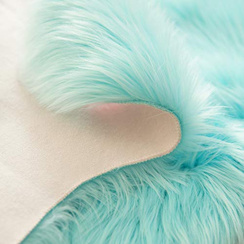 Ashler Ultra Soft Fluffy Area Rug Faux Fur Sheepskin Carpet Chair Ashler Extremely Gentle Fluffy Space Rug Fake Fur Sheepskin Carpet Chair Sofa Cowl for Bed room Flooring Couch Dwelling Room, Turquoise Spherical three x three Toes.