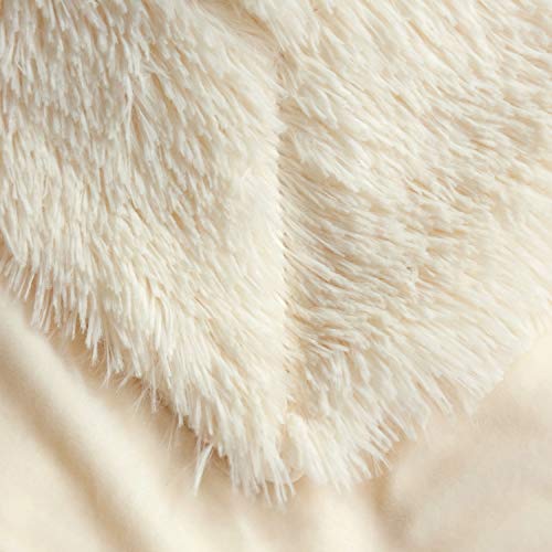 Comfort with Plush Shaggy Luxurious Fake Fur Blanket in Gentle Beige – Queen Size Cozy Bliss Wrap yourself in unparalleled comfort and style with our Plush Shaggy Luxurious Fake Fur Blanket in the inviting shade of Gentle Beige. This queen-sized blanket is the epitome of warmth and coziness, making it perfect for enhancing your relaxation time. Whether you're cuddling up on the sofa, adding an extra layer to your bed, or simply enjoying a quiet moment, this luxurious blanket is your ticket to pure relaxation. 🛌 Ultimate Softness: The front of this blanket boasts 100-percent polyester microfiber plush shaggy, providing a cloud-like softness that you'll love to touch and snuggle with. ❄️ Warm and Breathable: Experience the best of both worlds. This blanket offers exceptional warmth while maintaining breathability, so you stay cozy without overheating. 🌈 Elegant Appearance: Add a touch of grace and sophistication to your room's decor with the Gentle Beige shade. It effortlessly complements various interior styles. 🌟 No Shedding: Say goodbye to those pesky fuzz balls. Our high-quality Fake Fur Throw Blanket does not shed, ensuring your sofa and bed stay spotless.  