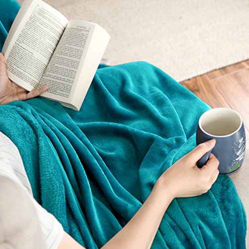 Teal Fleece Blanket Throw: Your Cozy Companion for Every Occasion Bedsure Teal Fleece Blanket Throw - a versatile, must-have addition to your home. This plush and lightweight blanket, measuring 50"x60", brings unparalleled comfort and style to your living spaces. Whether you're curling up on the couch to binge-watch your favorite series with a warm mug of hot chocolate or looking for the perfect nap companion at work, this cozy blanket has got you covered. Its importance extends beyond indoor coziness, making it an essential partner for outdoor adventures like camping or picnicking, ensuring comfort even in humid weather. 📺 Perfect TV Time 📺 - Make your TV time unforgettable with this Teal Fleece Blanket. It's your ideal couch companion on chilly nights.
