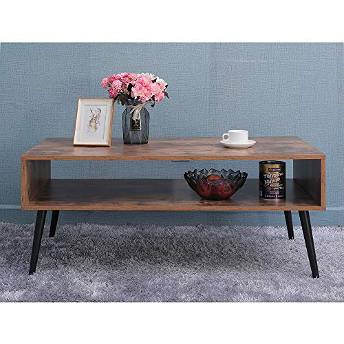 Mid-Century Coffee Table - Chic and Functional Furniture for Living Room, Bedroom, and Office! ☕🛋️ The mid-century design adds a touch of elegance to my bedroom, making it not just a piece of furniture but a statement in home decoration. Crafted from high-quality particle board material, it ensures a durable and long-lasting service life. The assembly process was a breeze—like solving a jigsaw puzzle, each part intelligently organized and labeled. This coffee table has seamlessly removed visual clutter from my space, offering a storage solution for daily essentials, office supplies, books, and even gaming consoles. It's not just a coffee table; it's a versatile piece that can be used as an entryway table, hallway desk, or sofa table. A true blend of form and function!