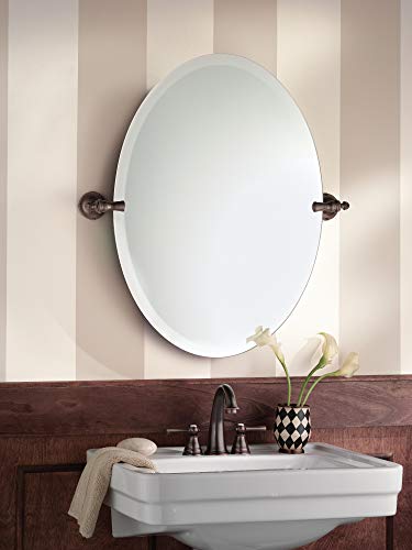 Moen Gilcrest 26-Inch x 23-Inch Frameless, Pivoting Bathroom Tilting Mirror Moen DN0892ORB Gilcrest 26-Inch x 23-Inch Frameless Pivoting Toilet Tilting Mirror, Oil Rubbed Bronze.