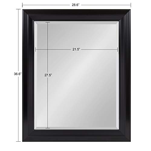 Kate and Laurel Whitley Black Framed Wall Mirror - Timeless Elegance for Your Space This large 27.5x33.5-inch mirror is not just a functional piece but a captivating addition to your home decor. The classic black frame complements any interior style, making it versatile for various design schemes. Perfectly sized to place over a dresser or any furniture you want to enhance, the mirror's shape and dimensions make it a focal point in any room. Impressive Size: 📏 The mirror boasts an outdoor frame dimension of 27.5 x 33.5 inches, making it a substantial and impressive piece for your wall. The size is perfect for placing over a dresser, creating a stunning focal point in your room.