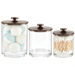 mDesign Modern Plastic Bathroom Vanity Countertop Storage Organizer Apothecary Canister Jar Set for Cotton Swabs, Rounds, Balls, Makeup Sponges, Bath Salts, Set of 3, Small/Medium/Large - Bronze/Clear
