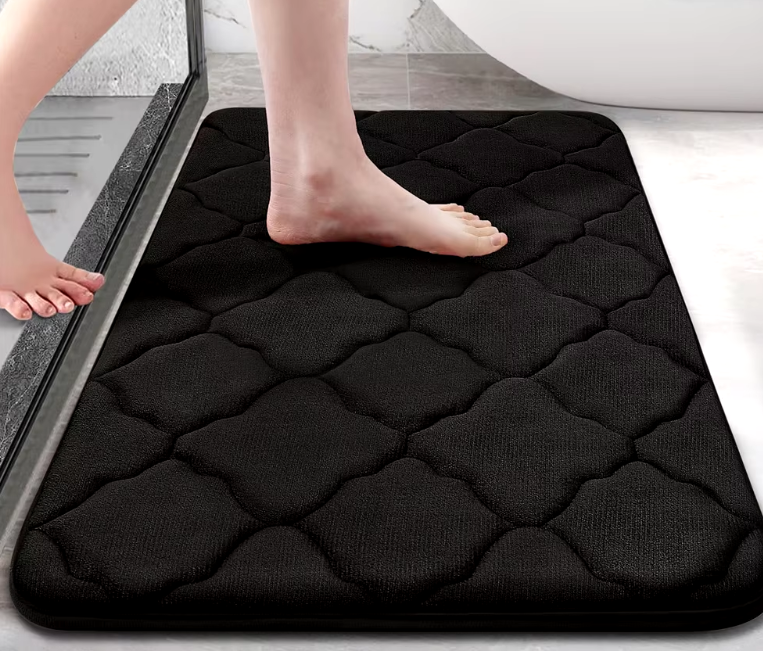 Soft and absorbent Olanly memory foam bath mat with non-slip rubber backing for a secure and comfortable feel